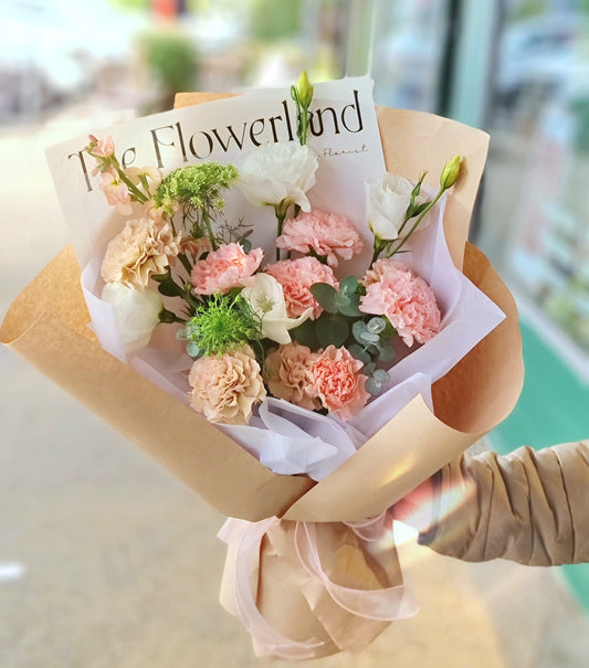 Same-day flower delivery Vermont - Signature Flowerland newsprint wrap bouquet for everyday local rituals.