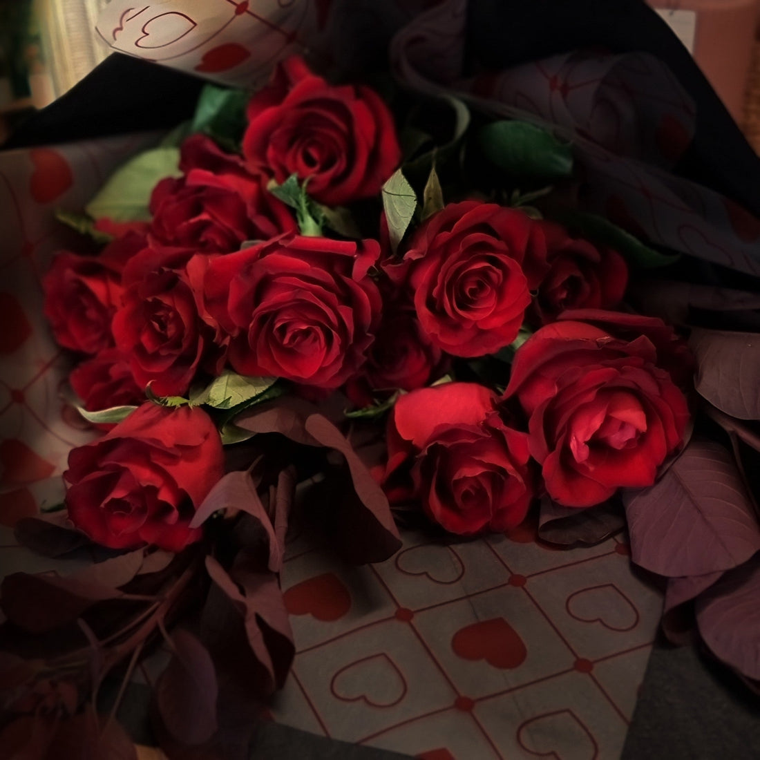 Premium red roses arrangement by Flowerland for Valentine's Day event at Break40 Greek Restaurant in Ferntree Gully, serving Ferntree Gully and Wantirna areas.