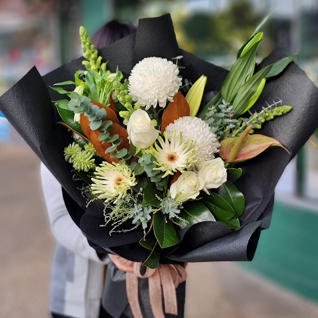 "Elegant white disbud chrysanthemum bouquet with native foliage by The Flowerland. Expertly crafted for premium delivery near Whitehorse Road and the leafy residential streets of Blackburn, Melbourne."