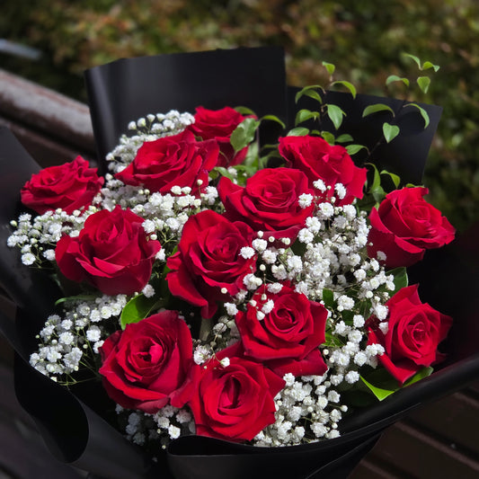 Classic long stem red roses arrangement with white gyp and fresh greenery premium black wrapping same-day delivery The Flowerland Nunawading