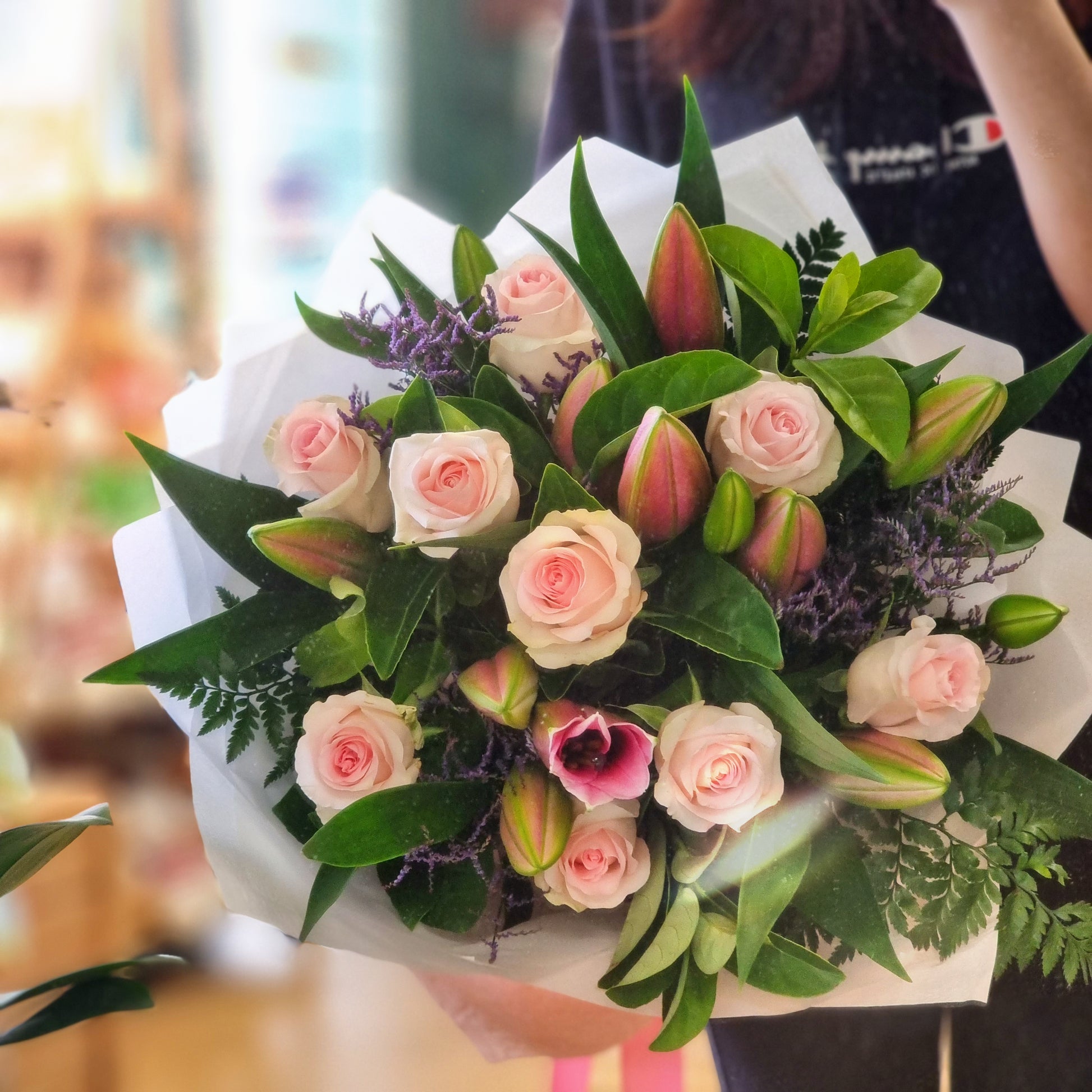Bespoke hand-tied bouquet with premium pink oriental lilies and soft roses delivered to Balwyn properties.