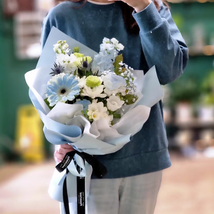 Elegant blue and white graduation bouquet with white roses ideal for Monash University Clayton campus ceremonies.