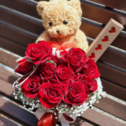 Romantic Teddy bear and roses basket with 12 premium red roses and heart chocolates same-day delivery The Flowerland Nunawading