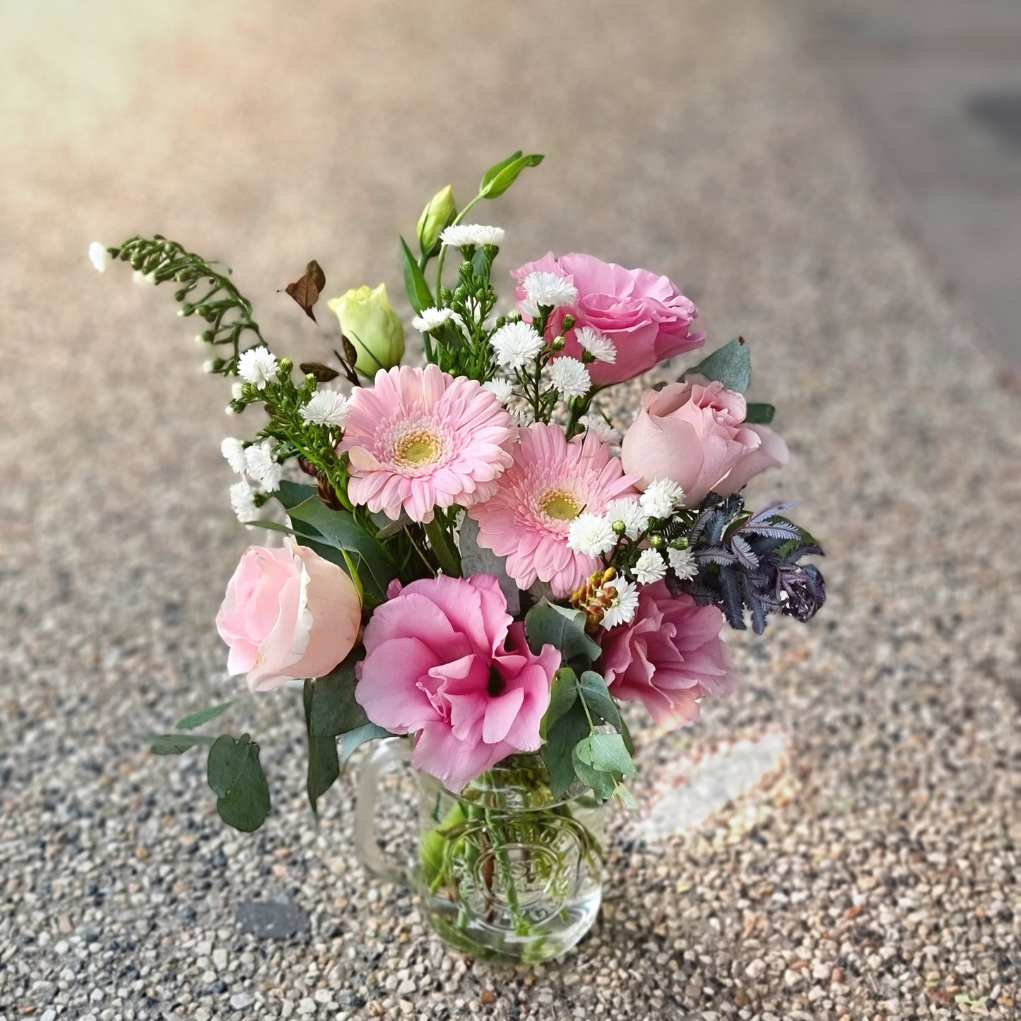 Charming seasonal posy jar flower arrangement handcrafted for same-day delivery to properties near Doncaster.