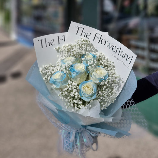 Premium fresh roses tinted with unique frozen blue colour treatment and fresh white baby's breath same-day delivery The Flowerland Nunawading