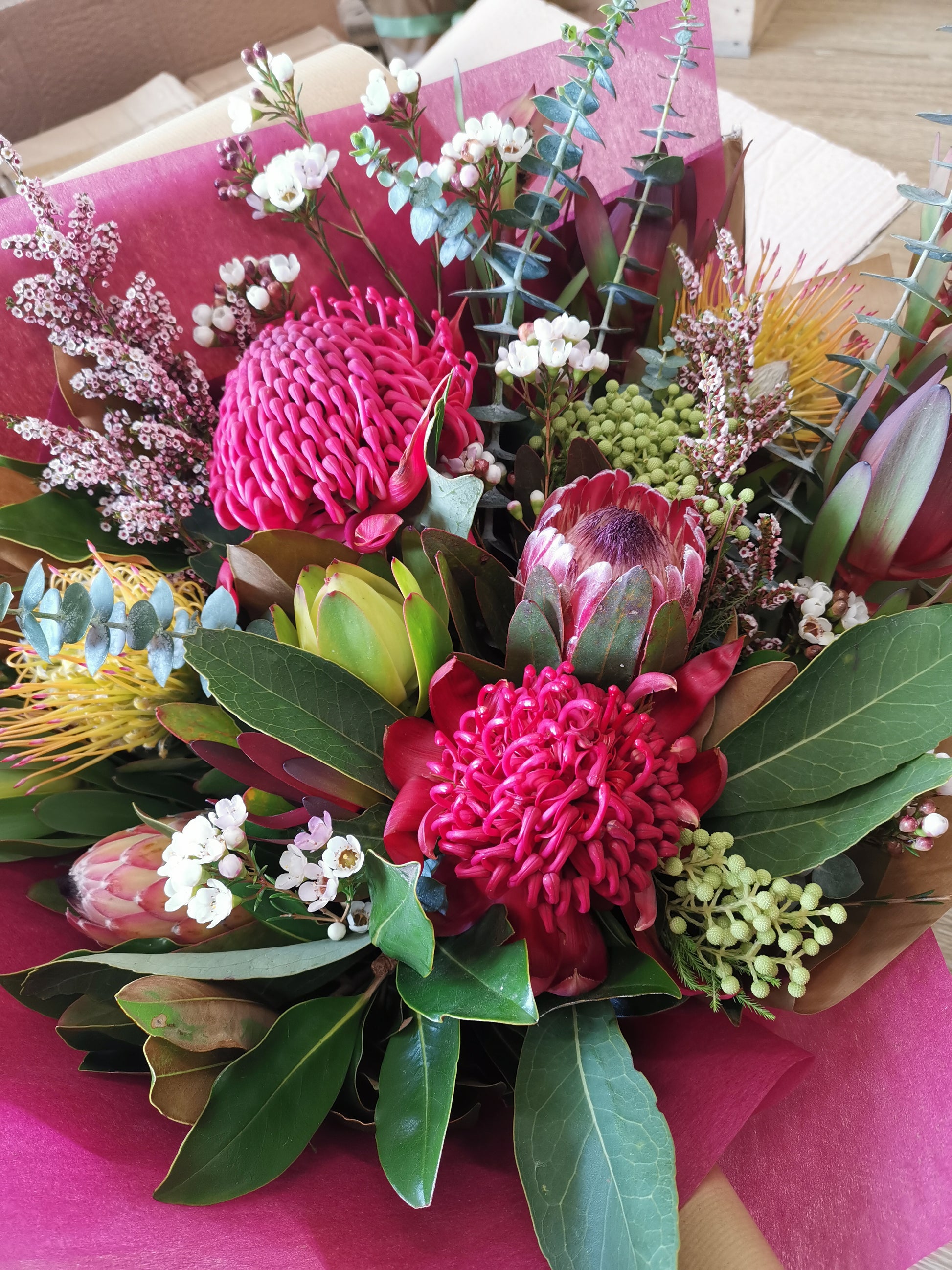 Hand-tied native flower bouquet featuring rustic texture for same-day delivery to established family residences in Mount Waverley.