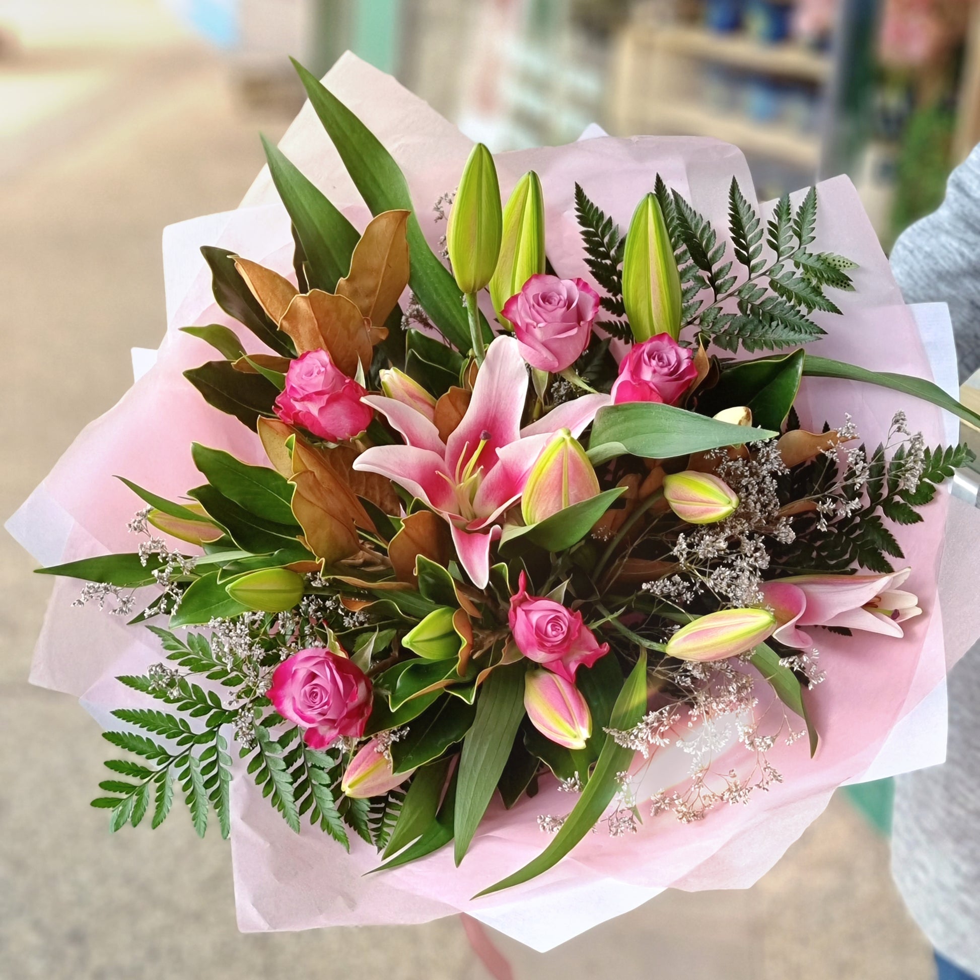 Classic elegant lily and rose bouquet pink with lush greenery and seasonal fillers same-day delivery Flowerland Nunawading