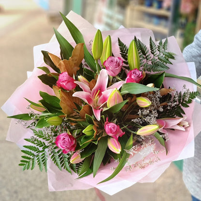 Classic elegant lily and rose bouquet pink with lush greenery and seasonal fillers same-day delivery Flowerland Nunawading