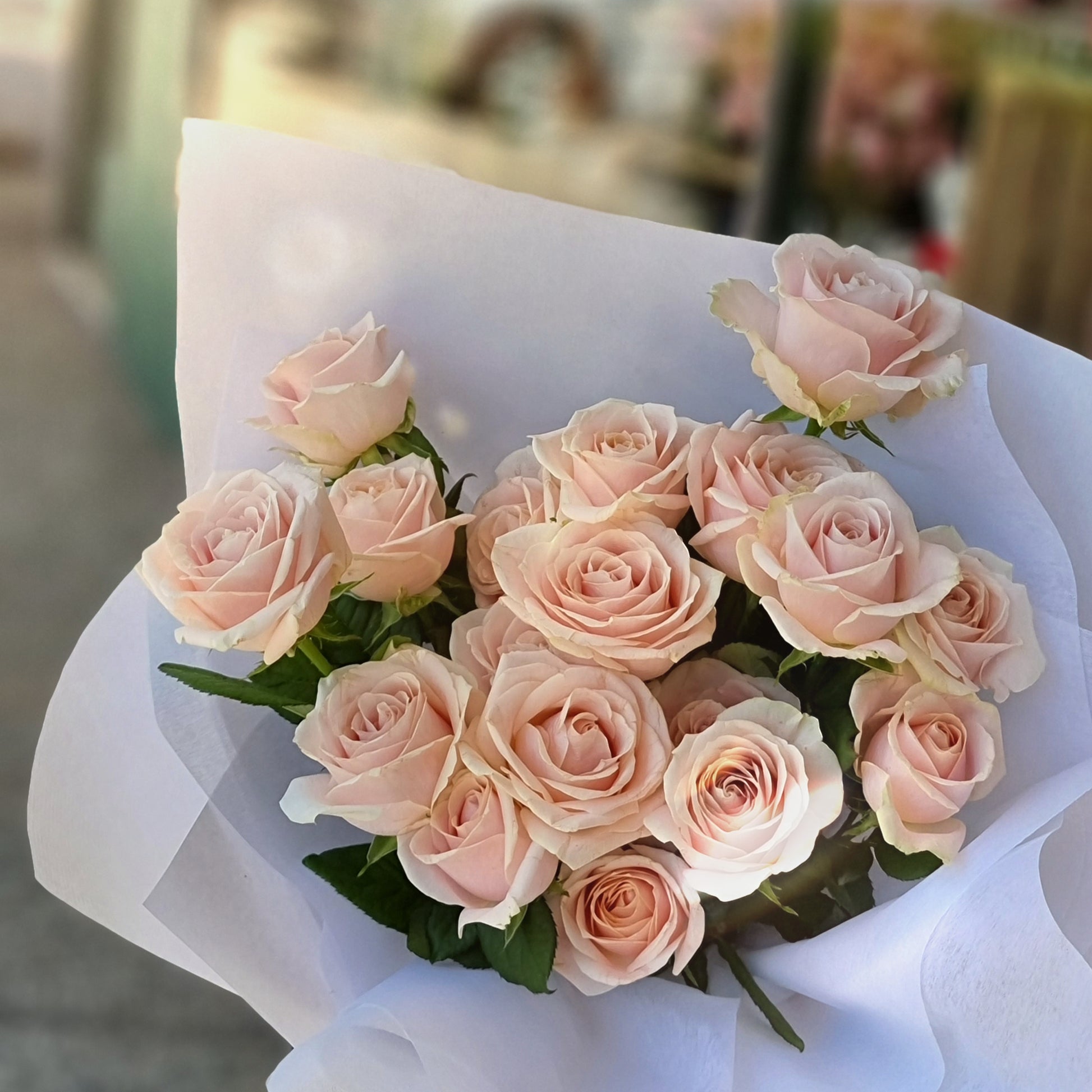Soft and pretty premium pink roses bouquet with delicate white wrapping paper same-day delivery The Flowerland Nunawading