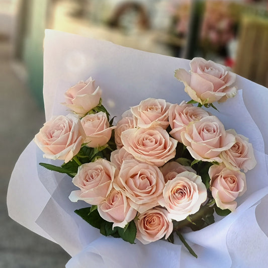 Soft and pretty premium pink roses bouquet with delicate white wrapping paper same-day delivery The Flowerland Nunawading