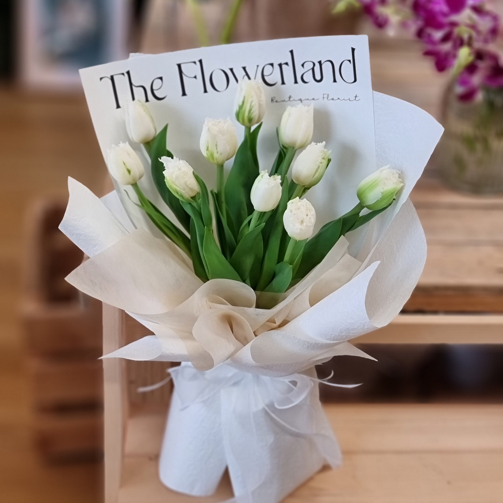 Vibrant seasonal tulips in a classic hand-tied bunch ready for fast transit throughout the entire Knox region.