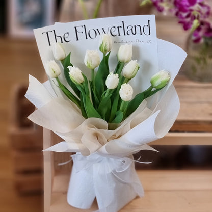 Vibrant seasonal tulips in a classic hand-tied bunch ready for fast transit throughout the entire Knox region.