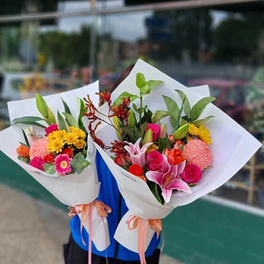 Vibrant bright flower bouquet with sunflowers and gerberas for same-day delivery Flowerland Nunawading