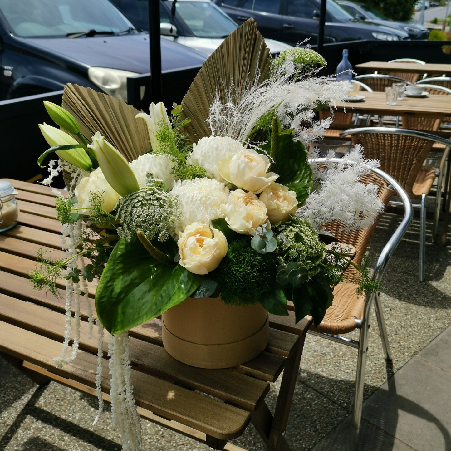 Custom premium flower hatbox with romantic carnations and imported roses handcrafted for luxury styling in Hawthorn.