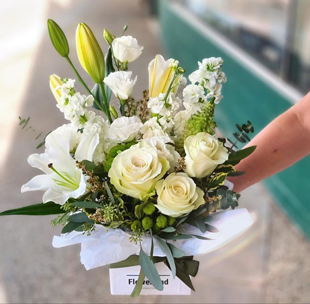 Elegant white box floral arrangement fresh seasonal white roses same-day delivery Flowerland Nunawading