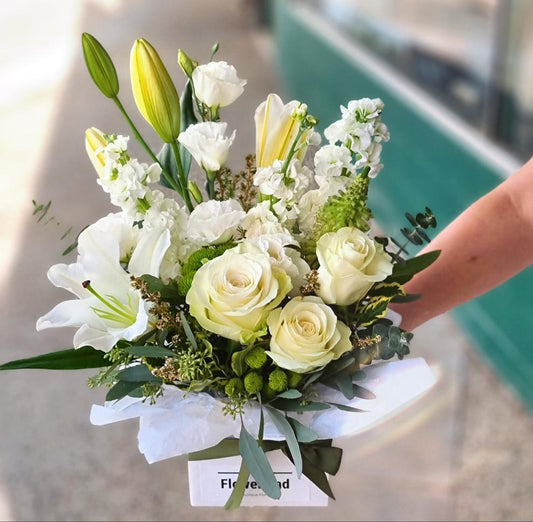 Elegant white box floral arrangement fresh seasonal white roses same-day delivery Flowerland Nunawading